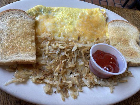 Mushroom and cheddar omelet with hash browns