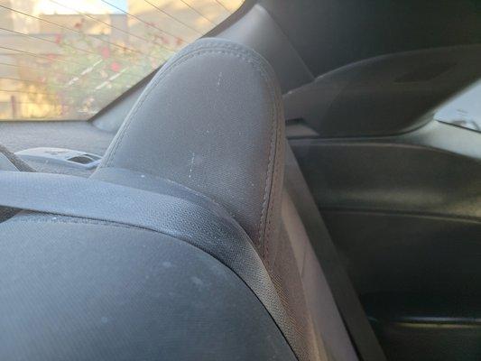 Splashed plaster of some sort all over my seat... This picture was taken after I cleaned it a bit.