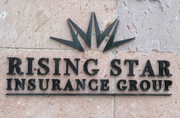 Rising Star Insurance Group Logo on building