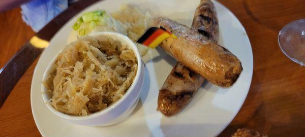 Bratwurst with mash potatoes and saurkrat