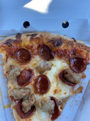 Fresh pepperoni and sausage slice