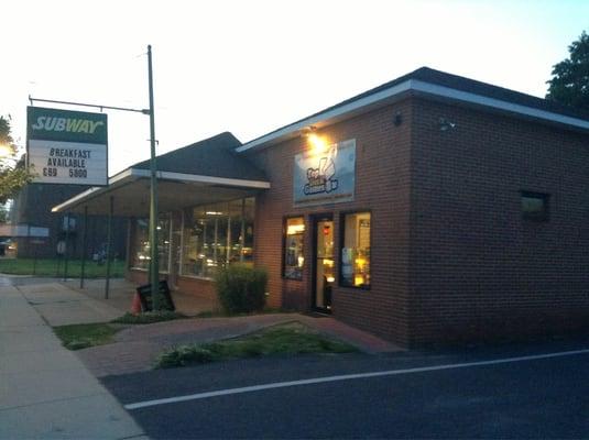 Store front next to a Subway sammich shop and across from a Rita's Water Ice. Much bigger than it looks inside!