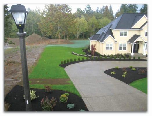 This home shows in the forefront our Rapid Gro lawn that was installed 2 weeks after our application...