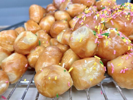 Donut Holes. Soft, sugary glazed treats; freshly made and you almost never can stop with just eating one.