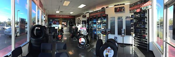 Big O Tires showroom, customer lounge, and digital displays panorama view