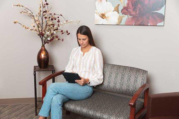 Patient waiting room which is comfortable. You can fill out forms and read our helpful informative materials.