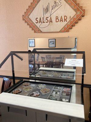 Salsa bar with many flavors to choose from