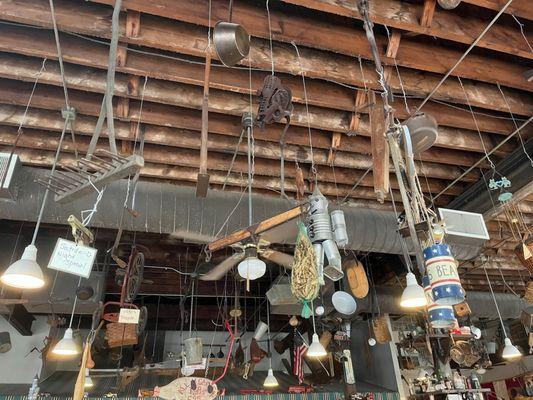 Vintage items hang from the ceiling