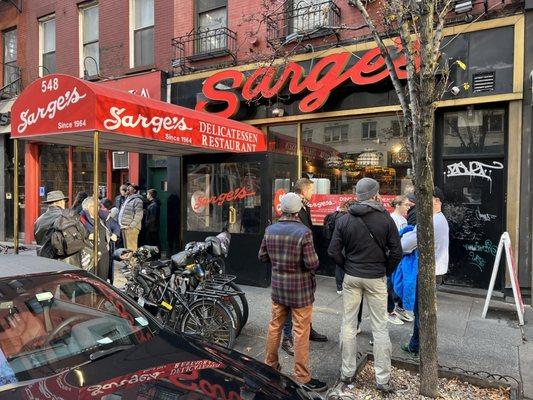 Outside the deli on a Saturday in December