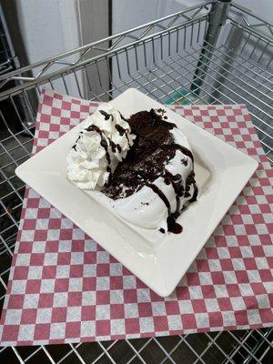 Our dressed fudge cake with 7 minute icing!