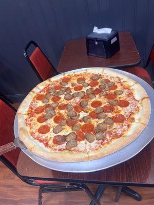 LG with pepperoni and sausage.