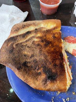 Bottom of the Stromboli that I thought was burnt for my taste.