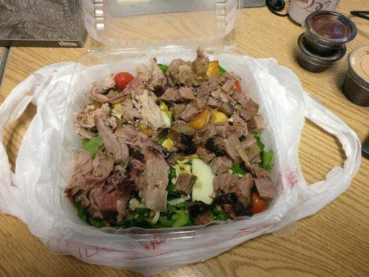 smokehouse salad with brisket and pork.