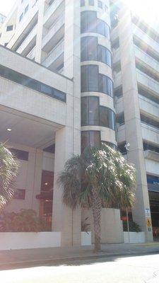 Parking garage. Clinics are enclosed on the top two floors.