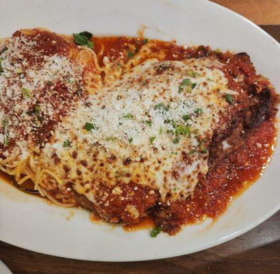 Eggplant parmigiana served with angel hair