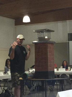 Ronnie from Ron Jon Chimney Sweep educating business owners in Framingham MA on the importance of chimney safety!