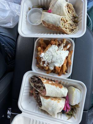 Amazing! One chicken and one lamb, Shawarma with their garlic fries. I was supposed to share, but I ended up eating most of it. Excellent!