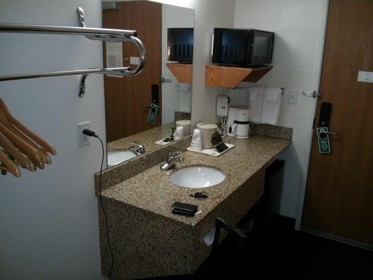 Separate sink, mirror, fridge, microwave