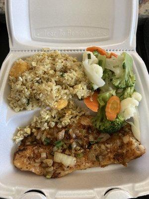 Grilled fish, sautéed vegetables and rice.