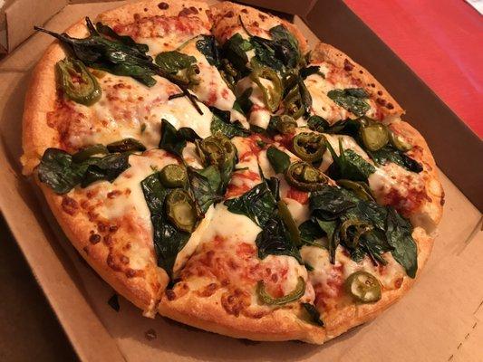 Medium pizza with spinach and jalapeños.