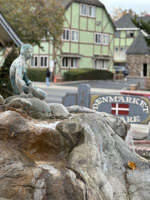 The Little Mermaid with the Denmark Square sign 12-17-23