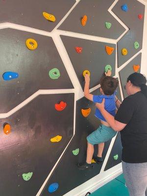 Rock climbing inside their center