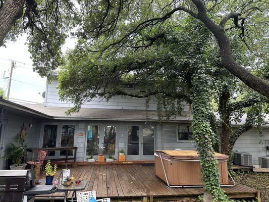 Removed three trees hanging over this two-story homebefore pics