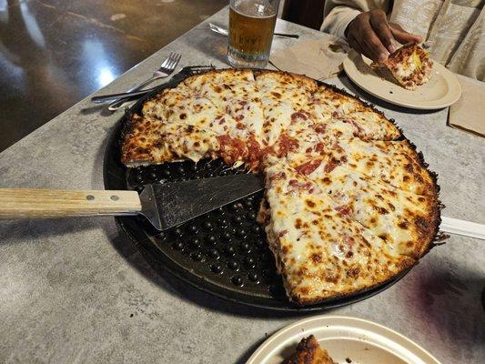 "Deep dish" sausage pizza