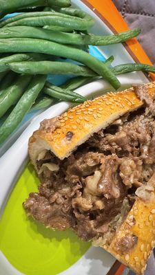 CHEESESTEAK. GREENBEANS COOKED AT HOME.