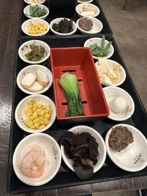 The "fixins" for the soups. Some vegis, tofu, tofu skin, quail egg and mushrooms.