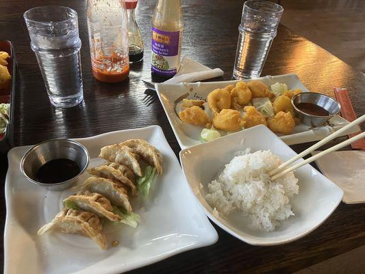 Gyoza, tempura shrimp, and steamed rice. My own combo.