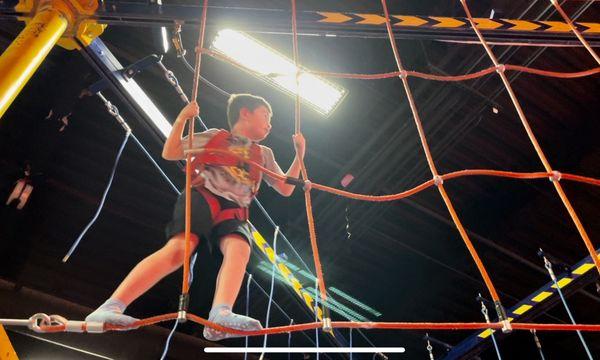 Crossing the difficult side on the overhead obstacle course