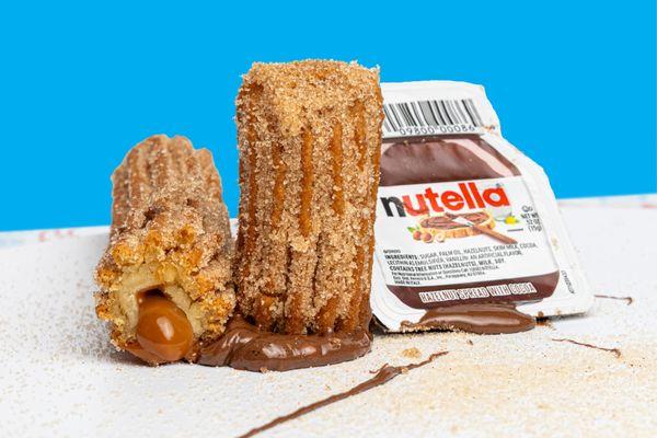 Our churro dulce de leche ! Served with a side of Nutella.