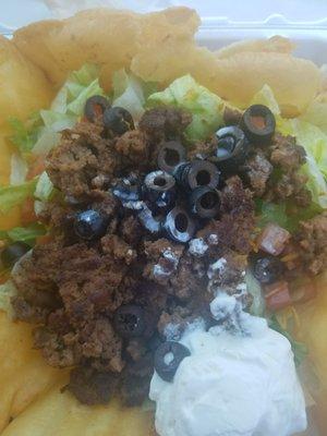 First and last time ordering  the so called taco salad was falling apart ground beef was old. then no napkins or fork