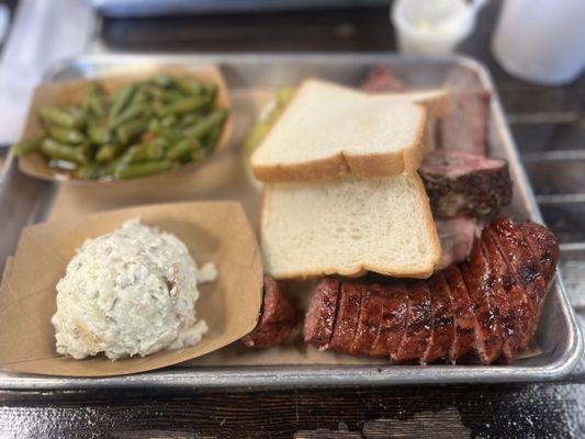 3 meats- sausage, ribs, brisket. Baked potato salad & Green Beans