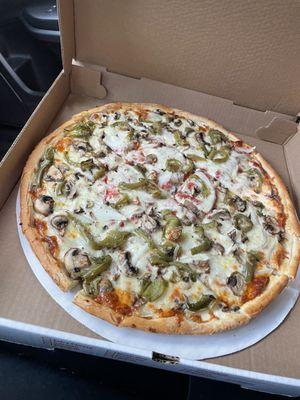 Large pepper, onion, mushroom cheese pizza.