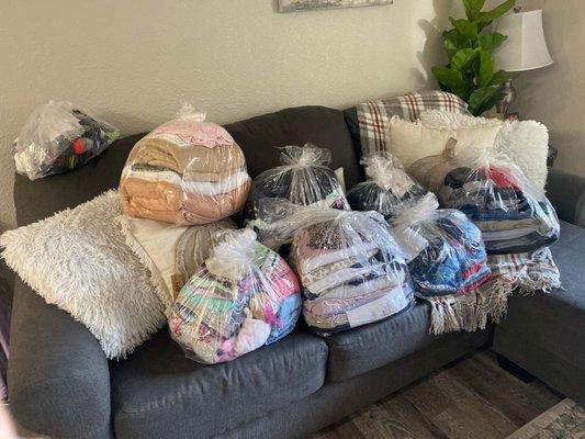 All my laundry items neatly folded and organized.