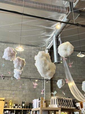 Lovely cloud decor with glass hummingbirds.