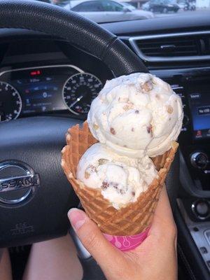 Two scoops nutty coconut in waffle cone!