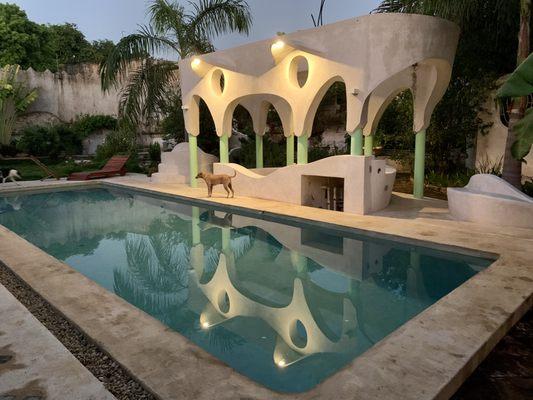 Large pool and pergola above the hot tub.  Design and construction supervision of this concrete structure at Hotel Calle Ouvert, Merida, MX