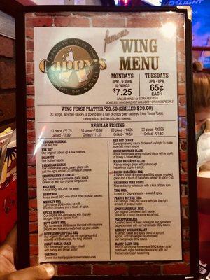 The wings menu. Talk about sauce selections.