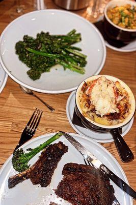 Ribeye Steak, broccolini, seafood Mac and cheese, hash brown casserole