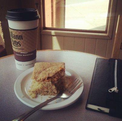 Large latte and a cinnamon coffee cake.