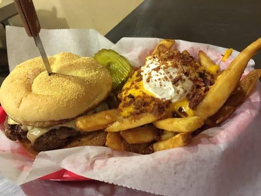 Cheese burger featuring our famous cheesy beer fries