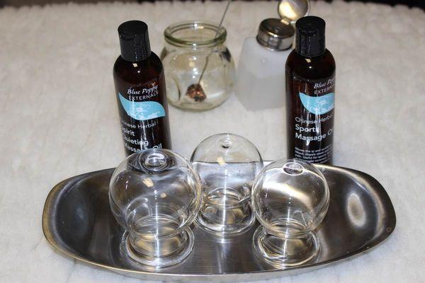 The glass cups and oils used for a cupping session!