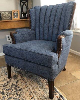 Finished reupholstered chair.