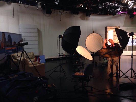 Steve Elizondo putting finishing touches on photoshoot set-up.