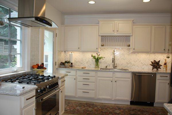 This Highlands kitchen was completely remodeled and the beautiful herringbone backsplash is evenly lit with our LED tape light.