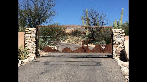 Beautiful Rusted custom Swing gate for an HOA community