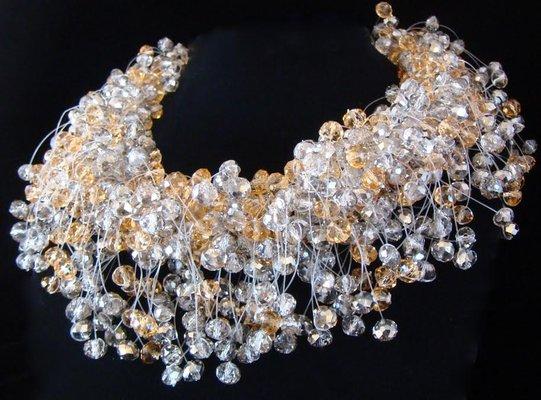 Hand made,very full crystal necklace with earrings to match in smoke and champagne colors...